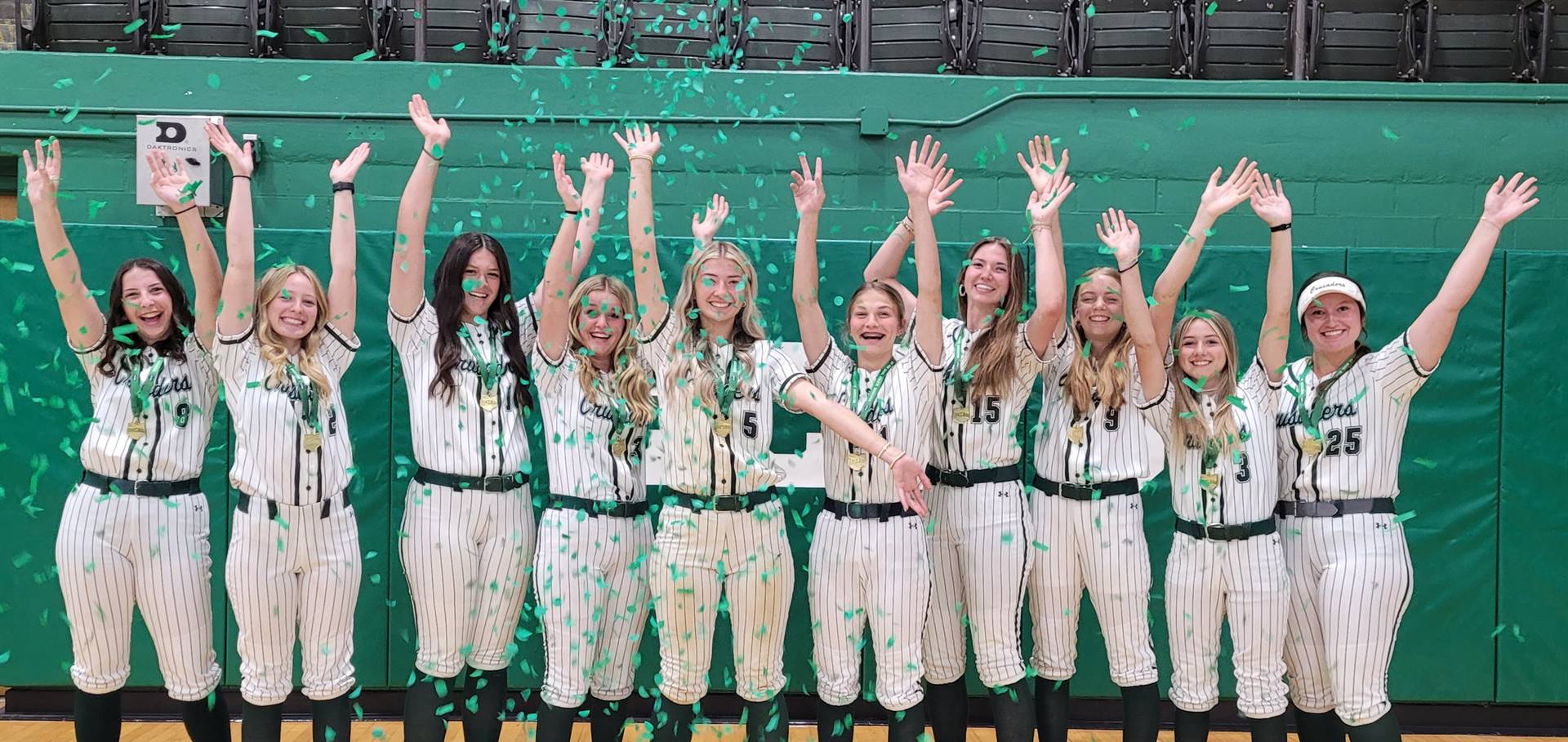 Softball Team celebrates their win