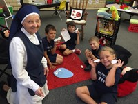 Nun with students